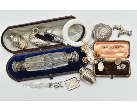 A BAG OF ASSORTED ITEMS, to include a cased double ended clear glass scent bottle, one end with a screw on embossed detail co