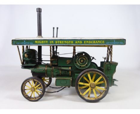 Tinplate model of a steam traction engine, boxed, H28cm    Condition Report   Click here for further images, condition, aucti