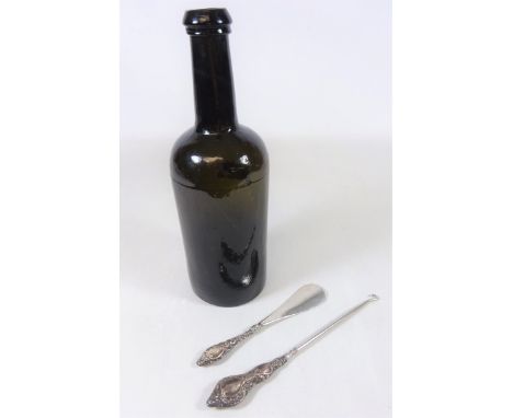 Late 18th/ early 19th Century English cylindrical shaped dark olive green wine bottle with string rim, H26.5cm Victorian hall