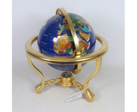 Polished mineral stone table globe on brass stand, H38cm    Condition Report   Click here for further images, condition, auct