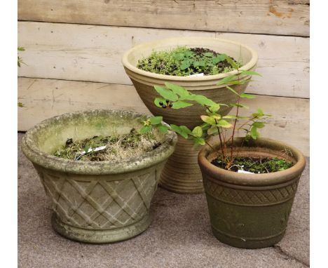 Composite stone garden planter with moulded decoration and two other planters