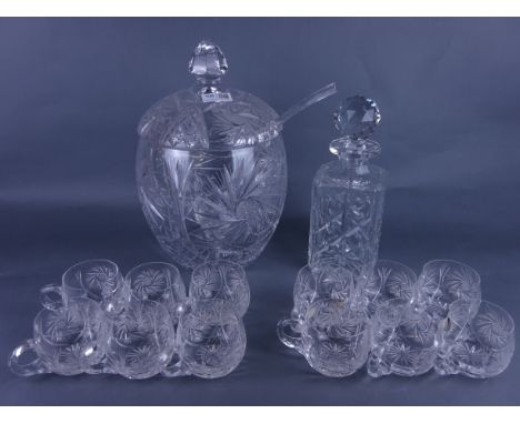 Large cut crystal lidded punch bowl with twelve glasses and ladle and a heavy cut crystal decanter    Condition Report   Clic