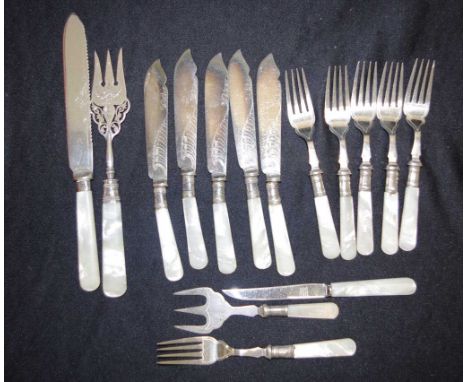 Group vintage MoP handle cutlery pieces including: set 6 each fruit knives and forks, a bread knife, and 2 various serving fo