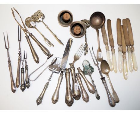Quantity of antique silver & silver plated cutlery (motley German), including ten loaded 800 silver handles and handled utens