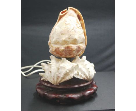 Carved conch sell lamp working, height approx 25cm