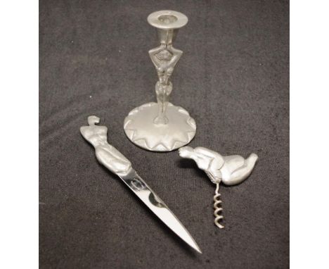 Carrol Boyes South African table wares comprising a candle stick, a letter opener, and a cork screw