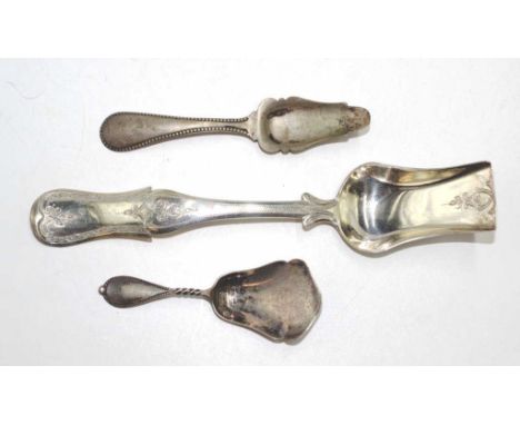 Three various Continental silver spoons each with Continental hallmarks, including: a decorated serving slice; and 2 various 