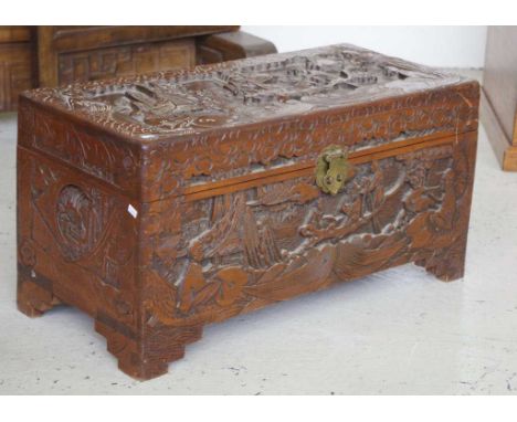 Chinese carved camphorwood trunk 72cm x 35cm, 37cm high approx (loose hinge.)