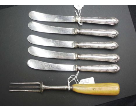 Five late Victorian butter knives Hallmarked London 1900,together with a Georgian silver plate 3 prong pickle fork.