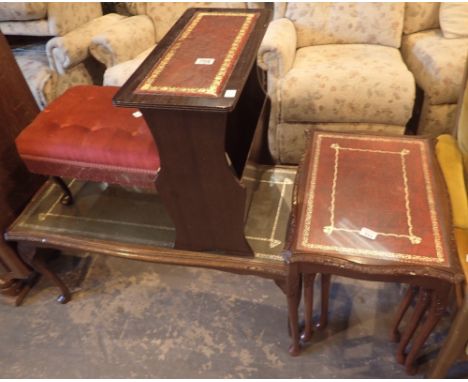 Nest of three red leather top tables matching magazine rack, green leather top oak coffee table and a red foot stool