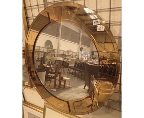 Circular mirror with peach surround 