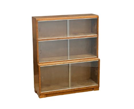 A vintage Minty oak stacking bookcase. 89x29x107.5cm. 1