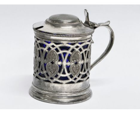 Thomas Wilkinson &amp; Son. A Late 19th Century plated mustard pot, with original Bristol Blue liner. Electroplate. 9.5x8.5cm