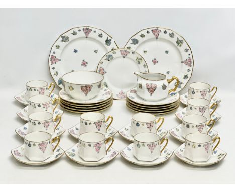 Paroutaud Freres, Limoges. An Early 20th Century 39 piece French gilt tea service. By Paroutaud Freres, Bernardaud (B&amp;Co)