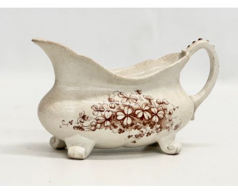 A Late 19th Century 2nd Period Belleek Pottery “Japanese Blossom” gravy boat. 19x11cm.