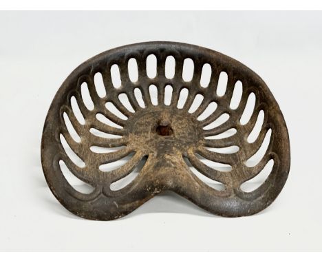 A vintage Albion tractor seat. 42x38cm