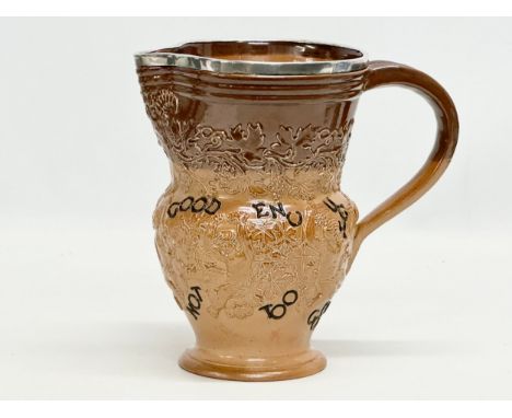 Silver mounted Doulton Lambeth. A Late 19th Century Doulton Lambeth jug. Good is not good enough, the best is not too good. C