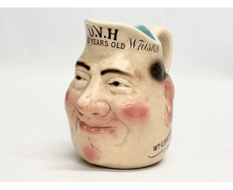 Greers Whisky. A Late 19th Century French toby advertising jug by Sarreguemines. Retailed by W. Greer &amp; Co LTD, Glasgow. 