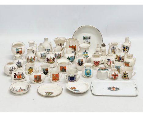 A collection of Early 20th Century crested porcelain and china. W.H. Goss, Willow, Grafton China, Victorian China, Nautilus C