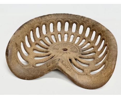 A vintage Albion tractor seat. Harrison &amp; McGregor &amp; Co. Leigh. 46x42cm.