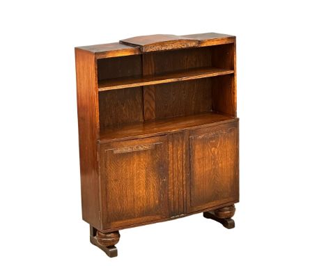 A 1930’s Art Deco oak open bookcase. 92x27x117cm