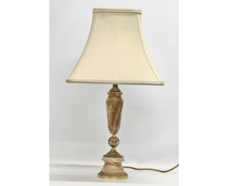 A brass and onyx table lamp. Base 43cm. 65cm with shade.