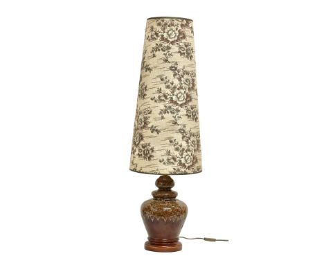A large West German Mid Century table lamp with original shade. 119cm