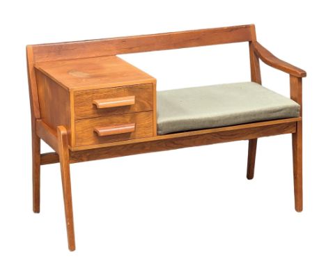 A Mid Century teak telephone bench by Chippy Heath. 1960’s. 91x43x63.5cm.