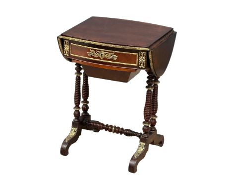 A 19th Century mahogany drop leaf work table with brass ormolu mounts and bobbin turn supports. Circa 1860-1880. Closed 50x45