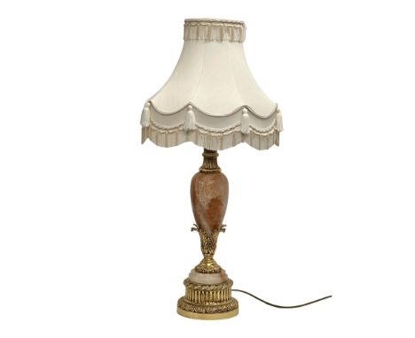 A large good quality brass and marble table lamp. Base 68cm. 93cm with shade.