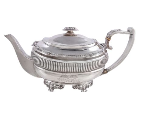 Ω A George III silver oblong baluster tea pot by Samuel Hennell, London 1818, with an oblong finial and a leaf capped angular