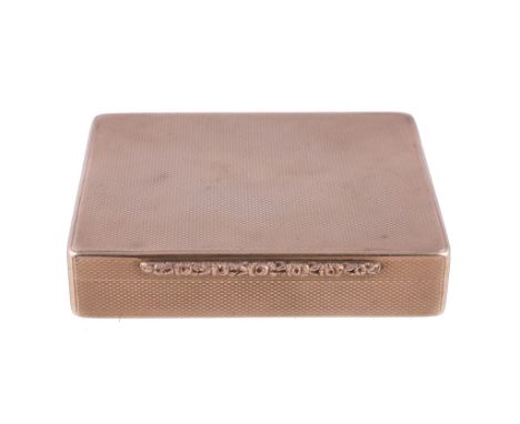  A 9 carat gold rectangular cigarette case,   London 1933, with engine turned covers, a foliate chased thumb piece, the inter
