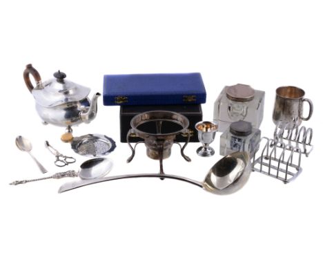 Ω A collection of silver and silver coloured items, to include: an oblong baluster tea pot, Birmingham 1910, with a compositi