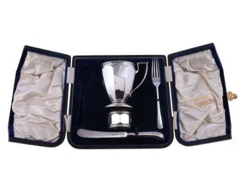  A cased silver matched christening set by Harrison Brothers  &  Howson,   London 1917, Sheffield 1916 and 1917, comprising o