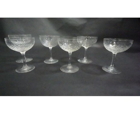 A set of six Champagne coupes with fish scale texture to the glass. H.11cm 