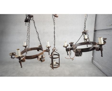 Two Tudor style wrought iron six branch hanging ceiling lights along with a cast iron lantern style ceiling light. D.62 D.10 