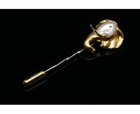 A 1980's Charles de Temple 18 carat gold and baroque pearl elephant head stick pin. Hallmarked with maker`s mark 'CdeT', 750,