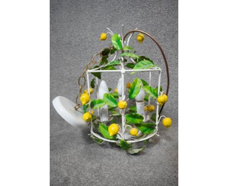 A vintage Italian toleware white painted lantern with ceramic lemons and leaves. H.41cm 