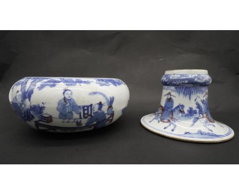 A Chinese Kangxi period porcelain spittoon on stand. Decorated with warriors and immortals. Kangxi mark to base. H.18 W.20 D.