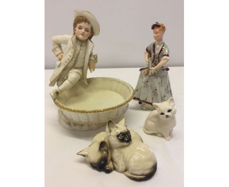 A Hadley Worcester figurine dish a/f together with 2 Royal Doulton cat figures and a Wedgwood Diana huntress figure.