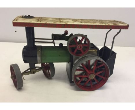 An unboxed Mamod steam tractor.