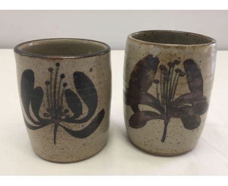 2 David Leach studio pottery beakers, one with 'DL' Seal. One unmarked. 9.5cm tall.