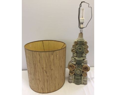 A double tier Bernard Rooke studio pottery lamp with original raffia drum lampshade. Beige and pale blue colourway. Signed to