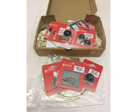 A box of O gauge railway parts.