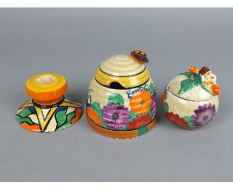 A CLARICE CLIFF BIZARRE GAY DAY HONEY POT, in the form of a skep, bee shaped knop to lid, printed and painted marks, height a