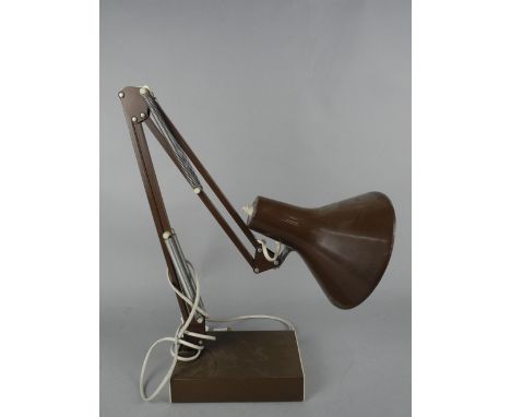 A BROWN ANGLE POISE DESK LAMP, on a rectangular base