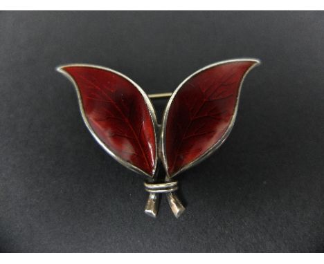 A WILLY WINNAESS FOR DAVID-ANDERSEN, a Norwegian silver and red enamel double leaf brooch, marked, width approximately 3.75cm