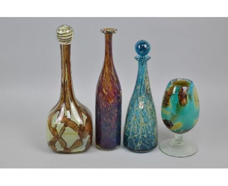 A GROUP OF MDINA GLASS, to include approximately 31cm earth tones decanter, two other decanters and an oversized wine glass v