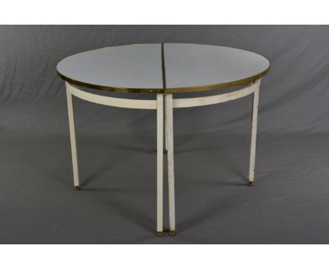 TWO INDUSTRIAL STYLE MID 20TH CENTURY HALF MOON CONSOLE TABLES, with brass banded edge (clips under table to form circular ta