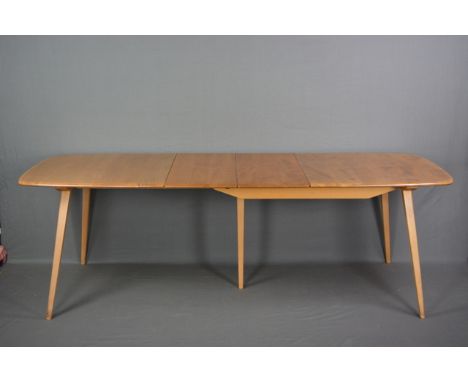 AN ERCOL ELM AND BEECH 1960'S FIVE LEGGED EXTENDING DINING TABLE, with double folding leaf, approximate size with leaf width 